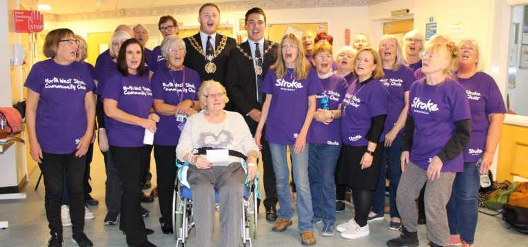 Choir members in Tameside hospital