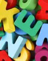Colourful letter blocks in a pile