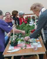 Members of Stubbington Stroke Support group decorating a long table